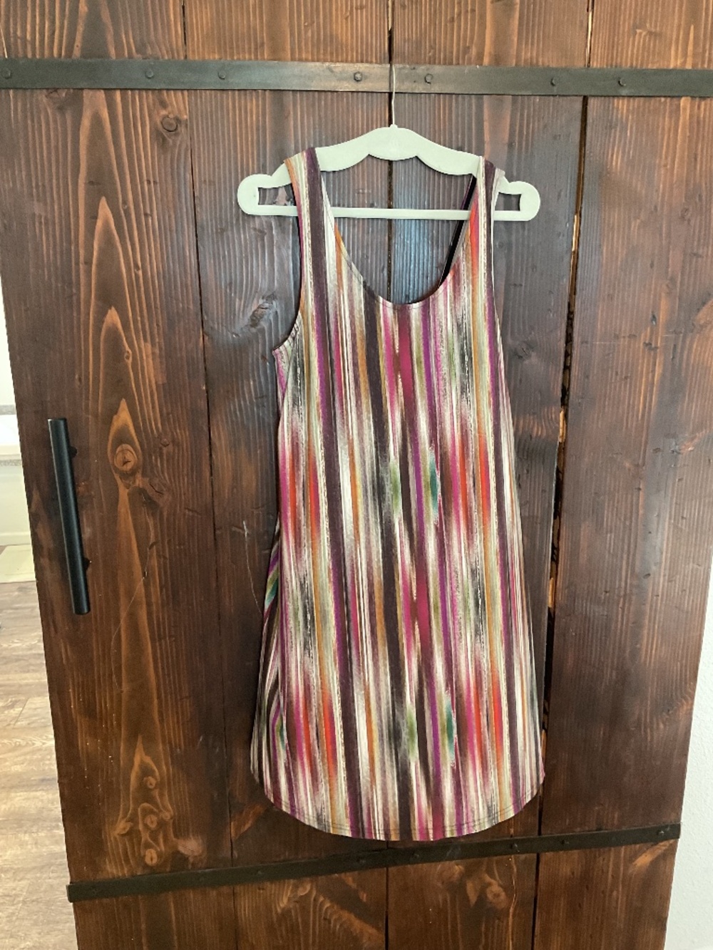 Sleeveless dress with stripes